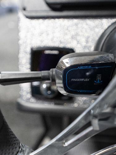 Slide: The Image of Close-up of 2023 Caymas DV 20 boat's FingerFlex control lever. - 24