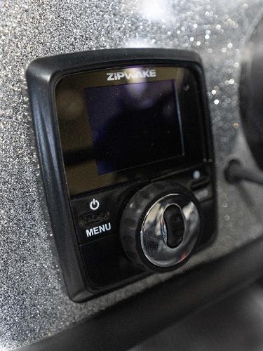 Slide: The Image of Close-up of Zipwake control panel on 2023 Caymas DV 20 boat. - 25