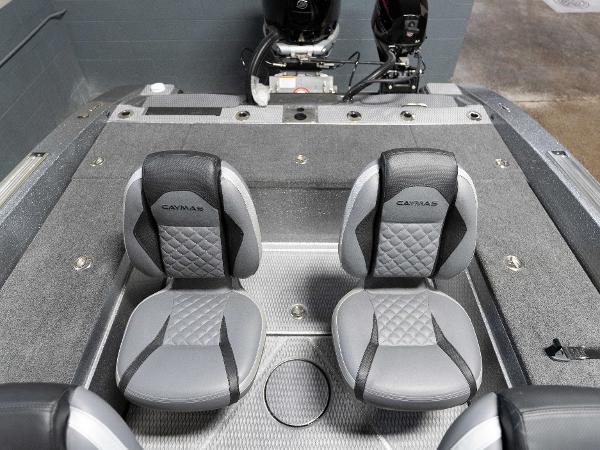 Slide: The Image of 2023 Caymas DV 20 boat interior with dual seats and outboard motors. - 29