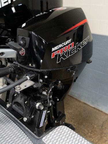 Slide: The Image of Mercury Pro Kicker outboard motor on a 2023 Caymas DV 20 boat. - 34