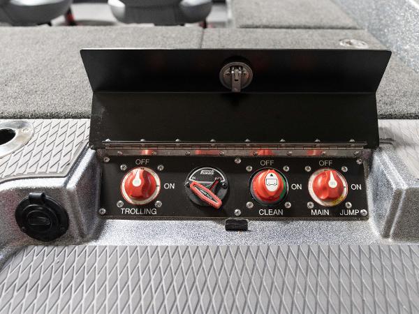 Slide: The Image of Control panel of 2023 Caymas DV 20 boat with switches for trolling, clean, main, and jump. - 37