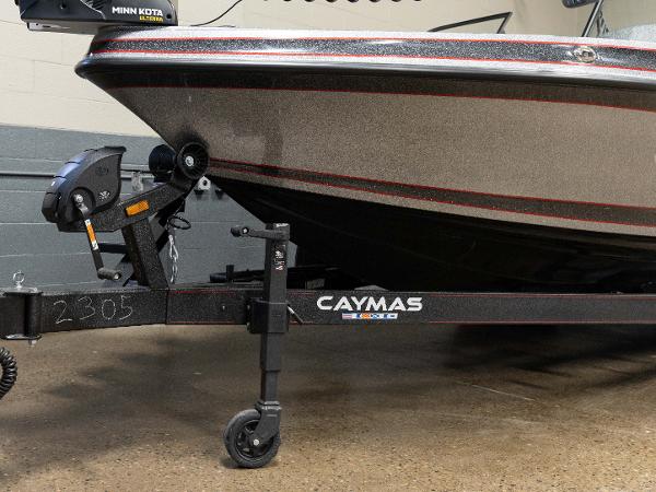 Slide: The Image of 2023 Caymas DV 20 boat on trailer with Minn Kota motor. - 43
