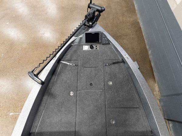 Slide: The Image of 2023 Caymas DV 20 boat bow with trolling motor and control panel. - 6