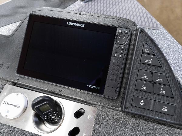 Slide: The Image of 2023 Caymas DV 20 boat dashboard with Lowrance HDS display and Minn Kota control. - 8