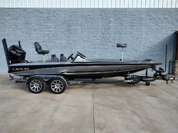 Slide: The Image of 2024 Caymas XS 20 Pro bass boat on a trailer, side view. - 0