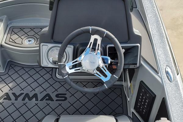 Slide: The Image of 2024 Caymas XS 20 Pro boat steering wheel and dashboard. - 6