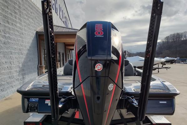 Slide: The Image of 2024 Caymas XS 20 Pro boat rear view with powerful outboard motor. - 8