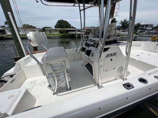Slide: The Image of 2004 Century 2000 Center Console boat interior with seating and control panel. - 7
