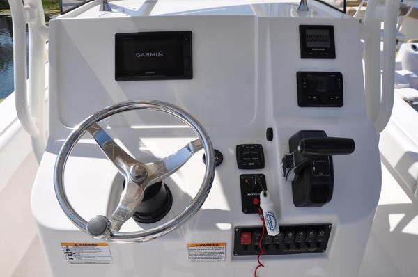 Slide: The Image of 2021 Century Coronado boat dashboard with Garmin navigation system and control panel. - 14