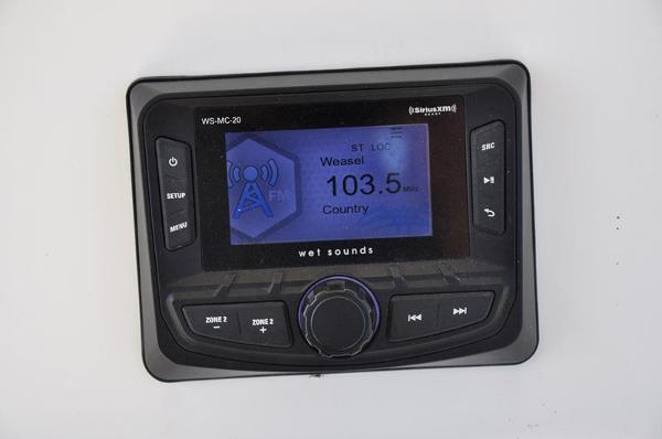 Slide: The Image of Century Coronado 2021 boat stereo system displaying FM radio station 103.5. - 19