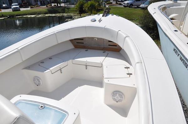 Slide: The Image of 2021 Century Coronado boat with spacious seating and storage compartments. - 27