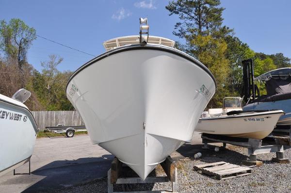 Slide: The Image of 2021 Century Coronado boat on a trailer in a yard. - 3