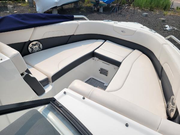 Slide: The Image of 2018 Chaparral 257 SSX boat interior with white and black seating. - 20