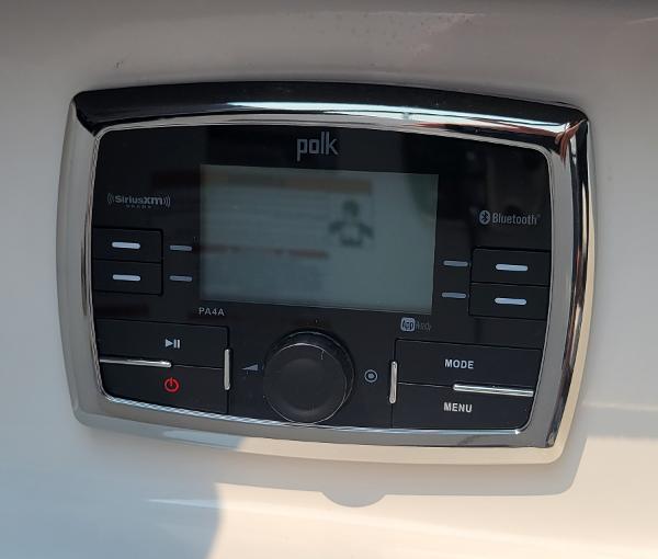 Slide: The Image of Polk audio system in 2018 Chaparral 257 SSX boat, featuring Bluetooth and SiriusXM. - 22