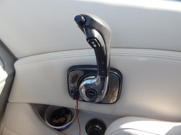 Slide: The Image of Throttle control lever on 2009 Chaparral 275 SSi boat, mounted on white interior panel. - 12