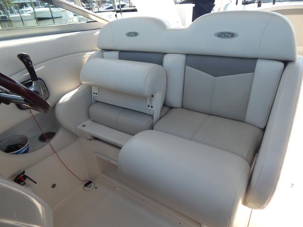 Slide: The Image of 2009 Chaparral 275 SSi boat interior with plush seating and steering wheel. - 27