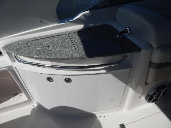 Slide: The Image of 2009 Chaparral 275 SSi boat interior with sleek countertop and storage. - 39