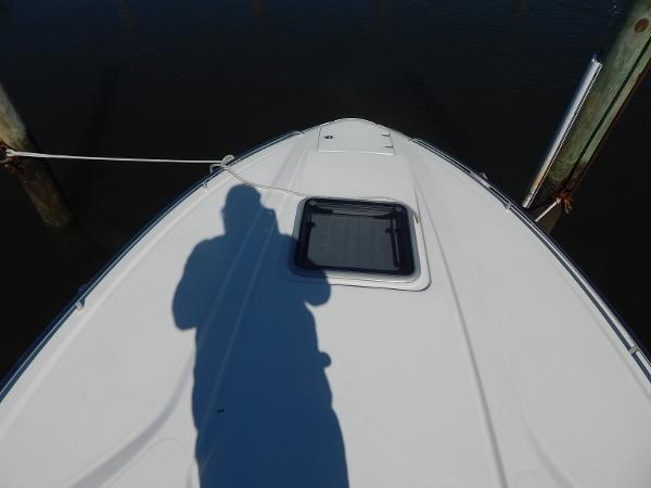 Slide: The Image of Bow view of 2009 Chaparral 275 SSi boat with shadow and dock ropes. - 49