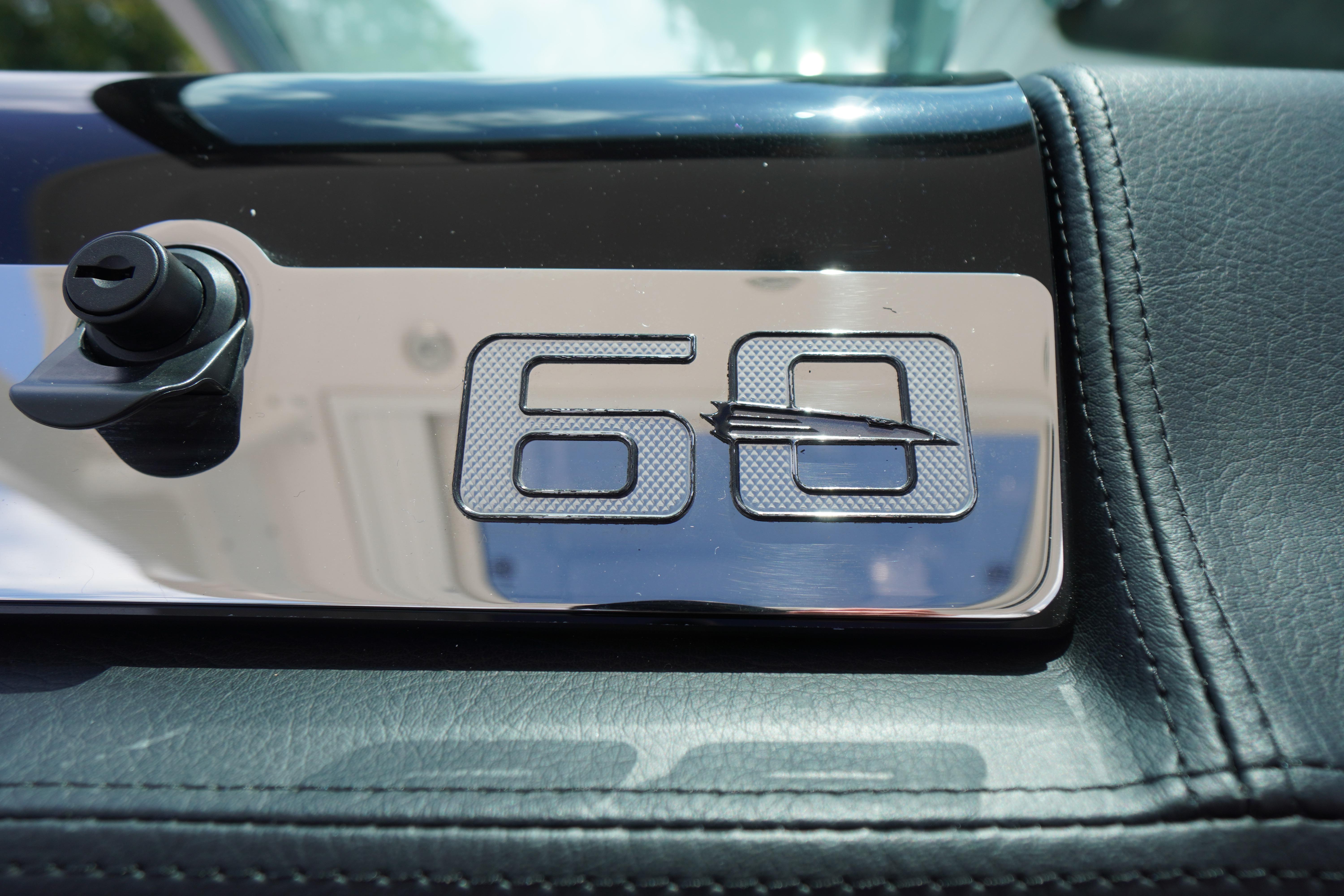 Slide: The Image of Close-up of Chaparral 280 OSX 2025 emblem on leather surface. - 30