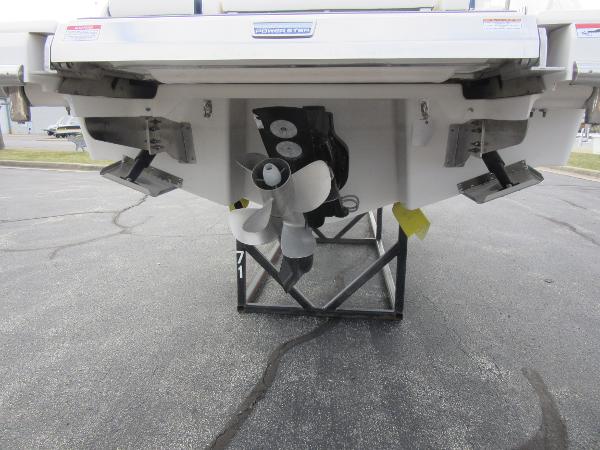 Slide: The Image of Rear view of 2024 Chaparral 287 SSX boat showing propeller and outdrive. - 12