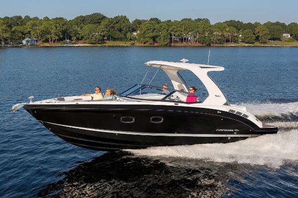 Slide: The Image of Manufacturer Provided Image: 2020 Chaparral 347 SSX boat cruising on a lake with passengers. - 1