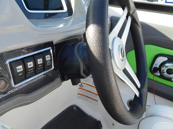 Slide: The Image of 2015 Chaparral Vortex 223 VRX steering wheel and control panel. - 23