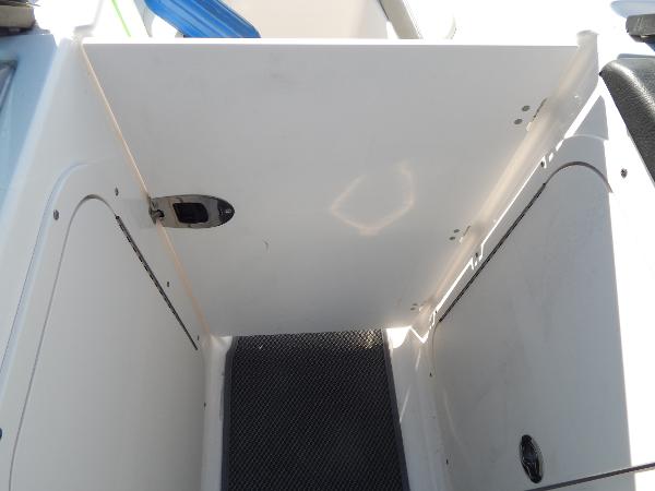 Slide: The Image of 2015 Chaparral Vortex 223 VRX storage compartment with open hatch. - 30