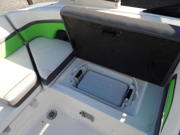Slide: The Image of 2015 Chaparral Vortex 223 VRX boat interior storage compartment with seating. - 31