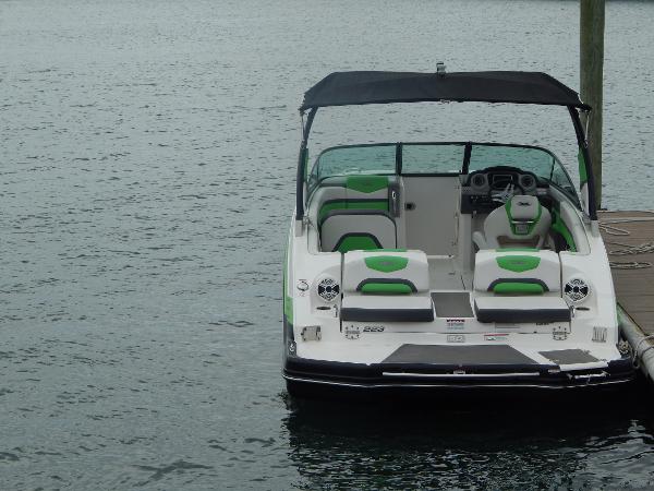 Slide: The Image of 2015 Chaparral Vortex 223 VRX boat docked on calm water. - 43