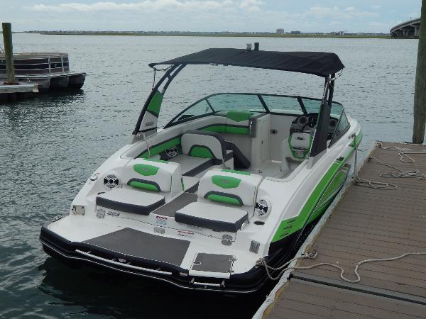 Slide: The Image of 2015 Chaparral Vortex 223 VRX boat docked by the pier. - 44
