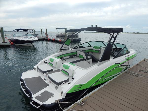 Slide: The Image of 2015 Chaparral Vortex 223 VRX boat docked at a marina. - 45