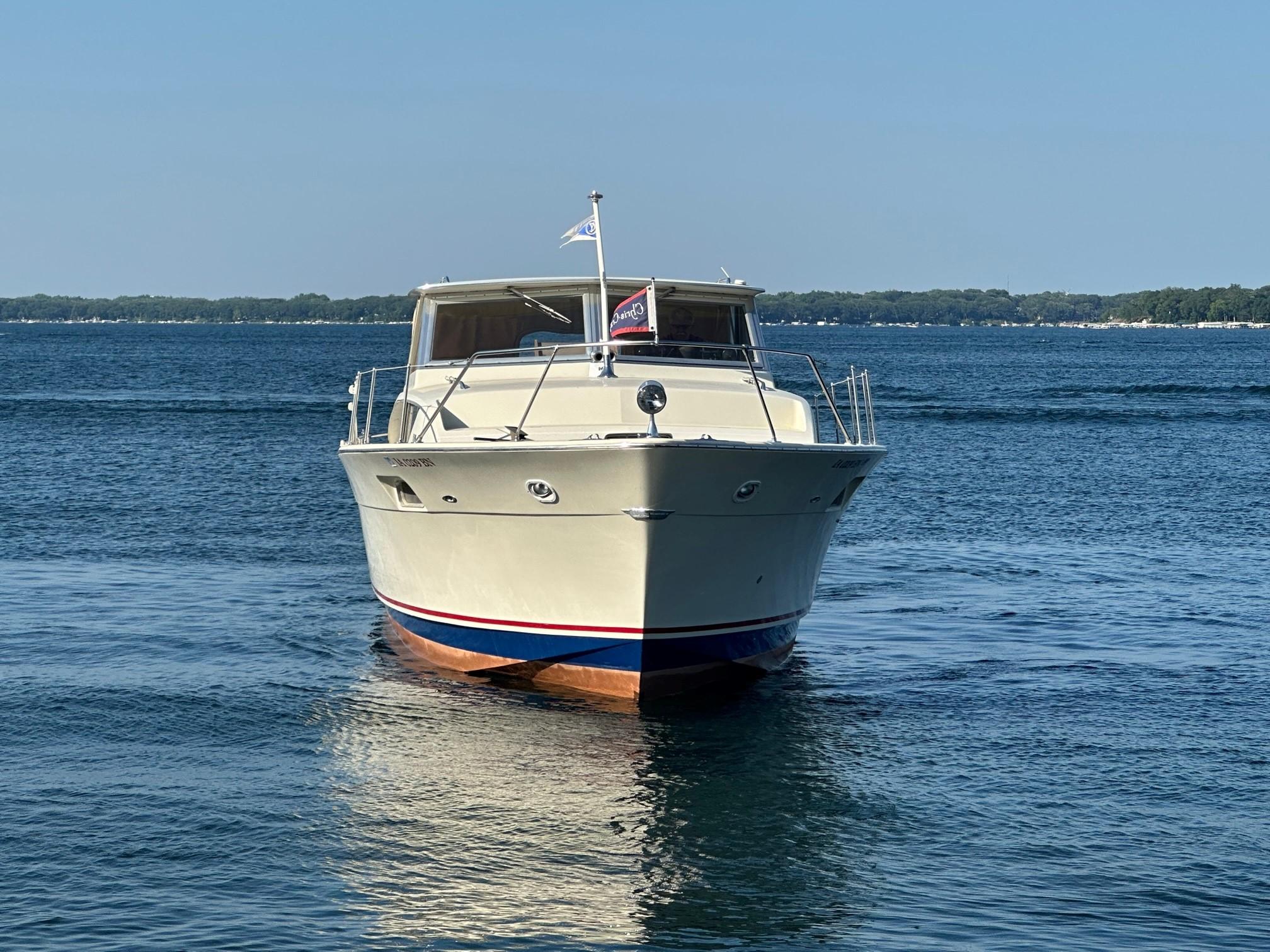 Slide: The Image of 1968 Chris-Craft 35 COMMANDER boat on calm water. - 6