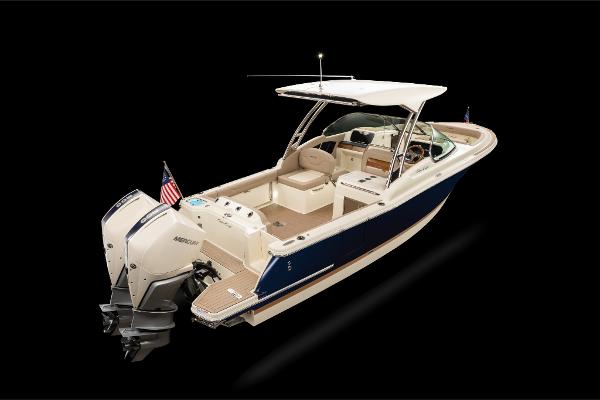 Slide: The Image of 2023 Chris-Craft Calypso 27 boat with dual outboard engines and sleek design. - 3