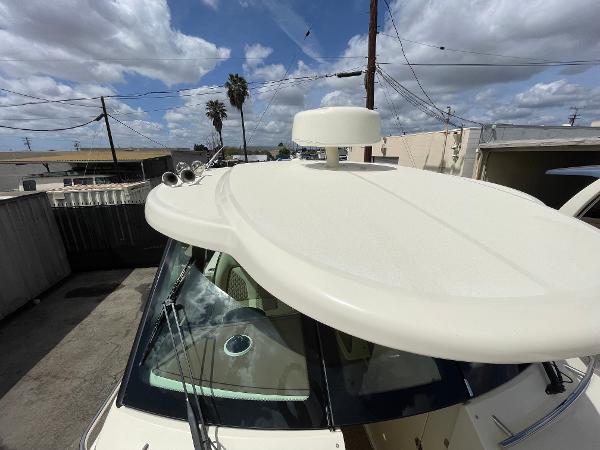 Slide: The Image of 2024 Chris-Craft Calypso 32 boat top view with radar and antennas. - 24