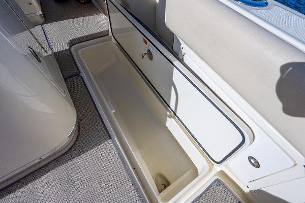 Slide: The Image of Storage compartment on 2019 Chris-Craft Catalina 27 boat, open and empty. - 26