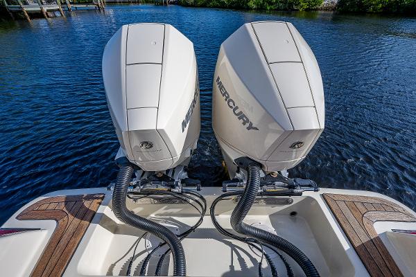Slide: The Image of Twin Mercury outboard engines on a 2019 Chris-Craft Catalina 27 boat. - 34