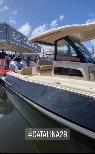 Slide: The Image of 2024 Chris-Craft Catalina 28 luxury boat at a marina event. #Catalina28 - 3