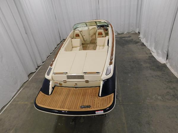 Slide: The Image of 2022 Chris-Craft Launch 27 boat with elegant interior and teak deck. - 9