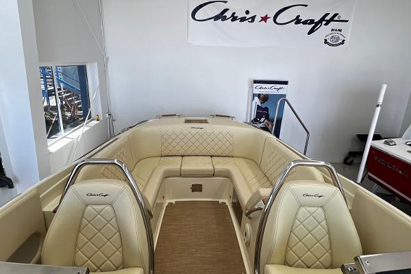 Slide: The Image of 2023 Chris-Craft Launch 27 boat interior with luxurious beige seating. - 10
