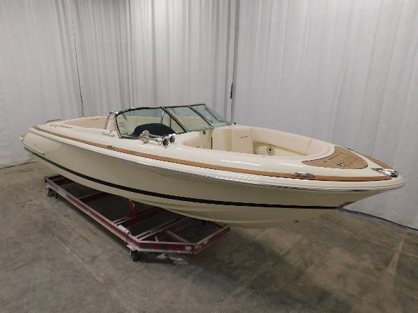 Slide: The Image of 2023 Chris-Craft Launch 27 boat in showroom. - 3