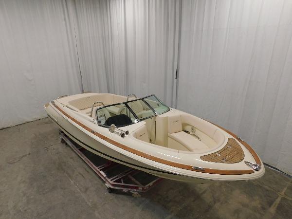 Slide: The Image of 2023 Chris-Craft Launch 27 boat in showroom. - 5
