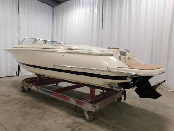 Slide: The Image of 2023 Chris-Craft Launch 27 boat in storage, side view. - 6