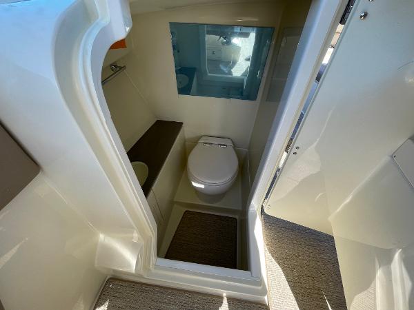 Slide: The Image of 2024 Chris-Craft Launch 28 GT boat interior bathroom with modern amenities. - 11
