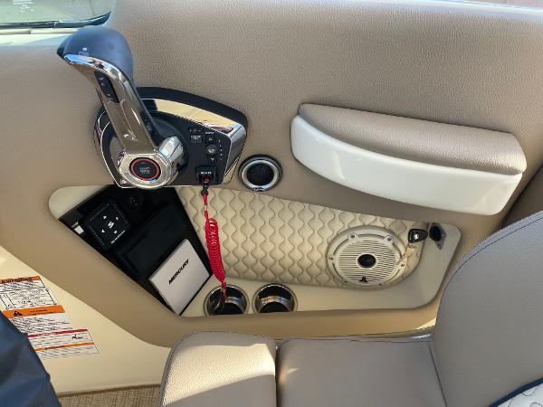 Slide: The Image of 2024 Chris-Craft Launch 28 GT interior controls and speaker detail. - 16