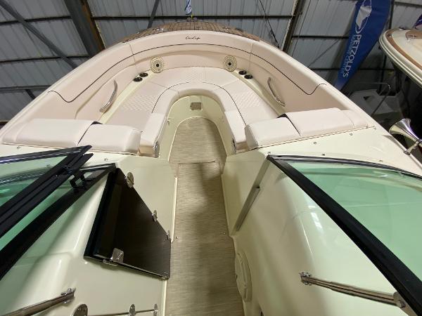 Slide: The Image of 2025 Chris-Craft Launch 28 GT interior, featuring luxurious seating and elegant design. - 19