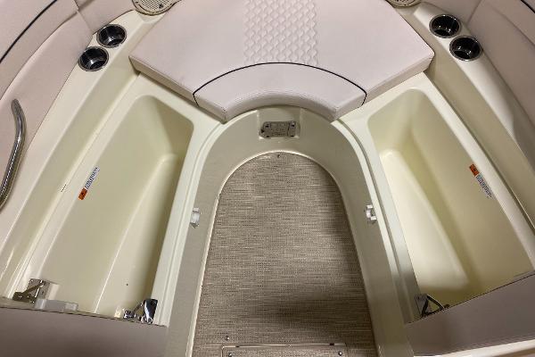 Slide: The Image of 2025 Chris-Craft Launch 28 GT interior with seating and storage compartments. - 20