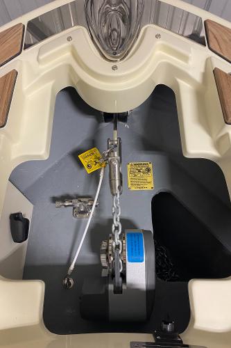 Slide: The Image of 2025 Chris-Craft Launch 28 GT anchor compartment with chain and mechanical components. - 22