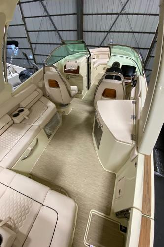 Slide: The Image of 2025 Chris-Craft Launch 28 GT interior, featuring luxurious seating and modern design. - 7