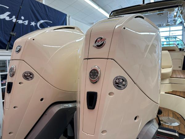 Slide: The Image of 2024 Chris-Craft Launch 31 GT boat engines in showroom. - 25