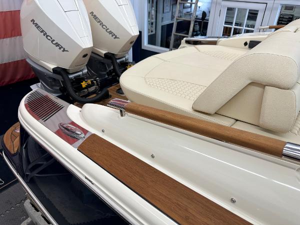 Slide: The Image of 2024 Chris-Craft Launch 31 GT with Mercury outboard engines and luxurious seating. - 3